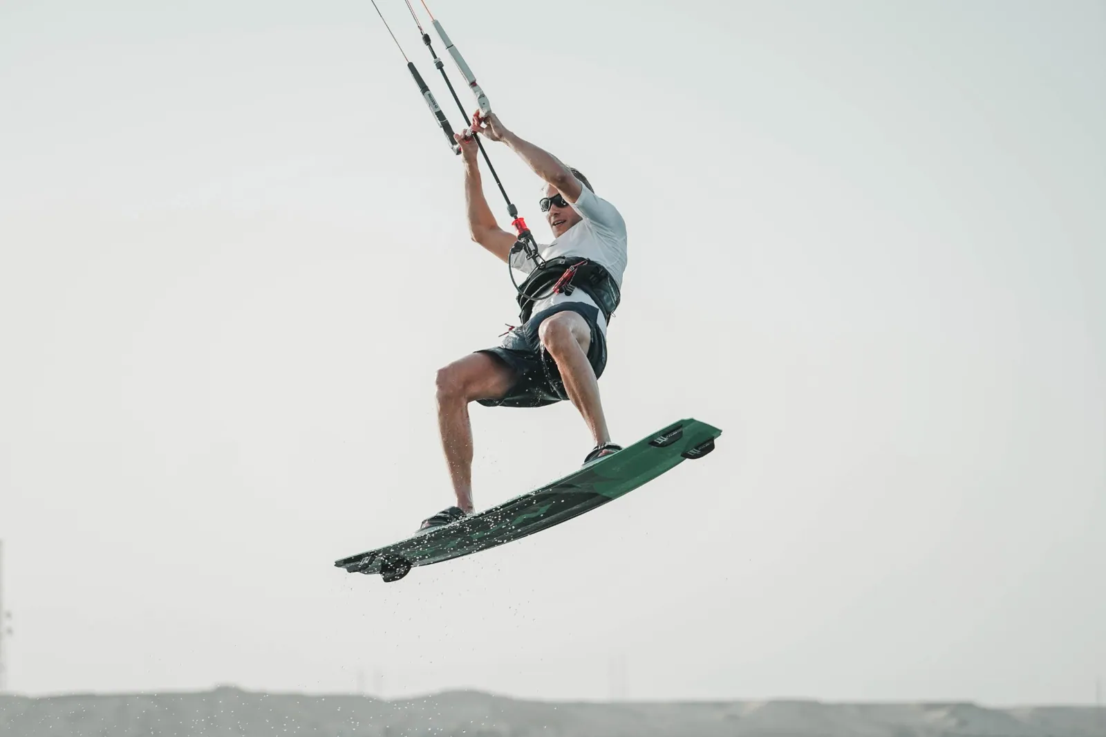 Kitesurfer in the air above the Dakhla lagoon